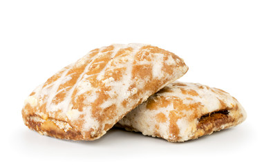 Two gingerbread close-up on a white background.
