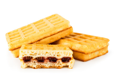 Waffles with jam close - up on a white. Isolated.