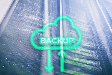 Backup button on modern server room background. Data loss prevention. System recovery