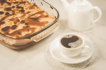 breakfast with apple pie and a cup of black coffee/breakfast with apple pie and a cup of black coffee on a white marble background