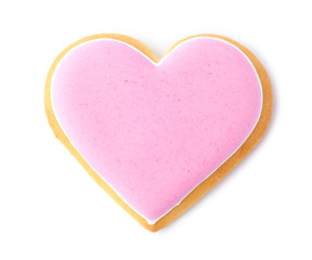 Decorated heart shaped cookie on white background, top view