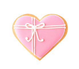 Decorated heart shaped cookie on white background, top view