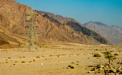 Power lines passing through the mountains of Egypt
