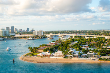 Ft Lauderdale landscape with small beach and bridge at Port Everglades.