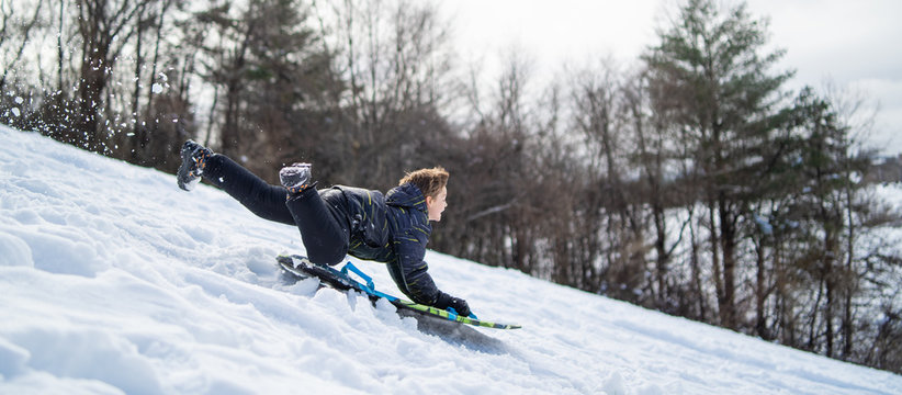 Little Dare Devil Jumping Ramp Snow Sledding 