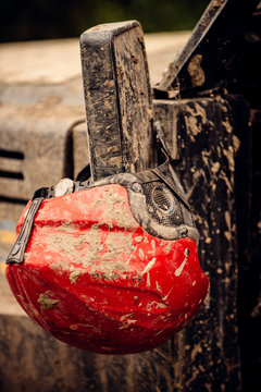 Protecting Your Head. Helmet Of Lightweight Plastic Material. Crash Helmet In Dirt. Motocycle Or Automobile Helmet. Dirty Headgear Or Hard Hat. Protective Gear