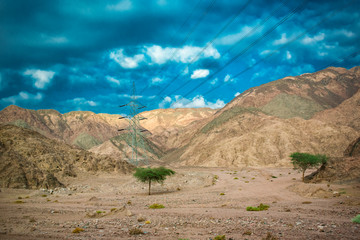 Power lines passing through the mountains of Egypt