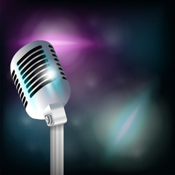 Realistic microphone on blurred background