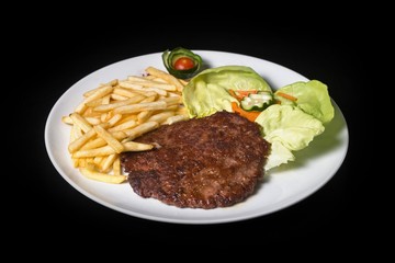 hamburger with french fries isolated on plate.