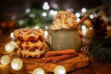 Christmas background.waffles with a cappuccino.