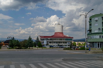 A residential district of contemporary macedonian  houses and Cultural House in  town Delchevo among Maleshevo and Osogovo mountains, Macedonia, Europe 