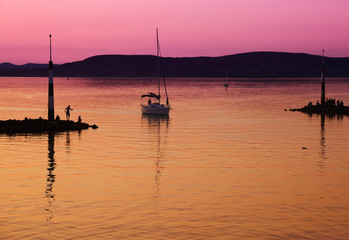 Sailing boats on Lake Balaton at sunset