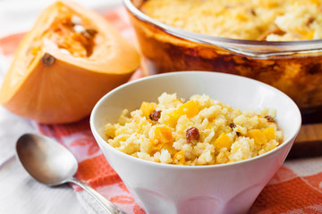 Milky cereal porridge with pumpkin and raisins