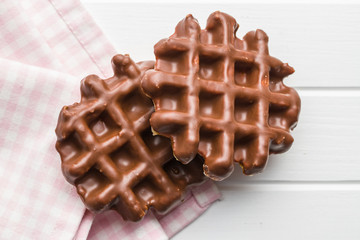 Waffles with chocolate topping.