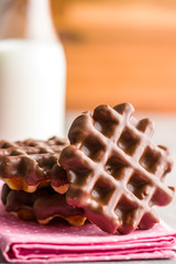 Waffles with chocolate topping.