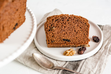 Homemade gingerbread cake on white plate. Honey cake.