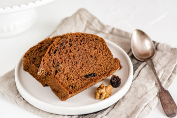 Homemade gingerbread cake on white plate. Honey cake.