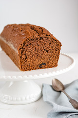 Homemade gingerbread cake on white plate. Honey cake.