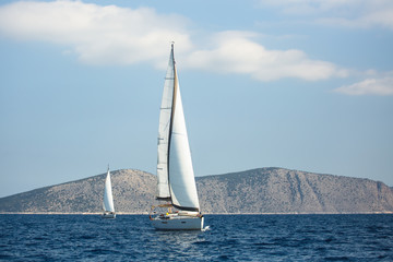 Fototapeta premium Sailing luxury yacht boats in regatta, Aegean Sea, Greece.