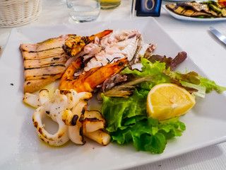 seafood dish mixed plate of grilled  fresh fish