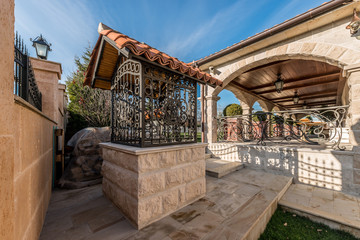 The well in yard of new retro house