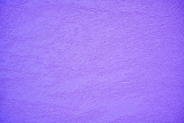 The texture of plastered ultraviolet or magenta wall, background