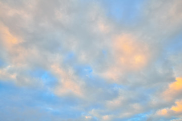 Beautiful sky with clouds in blue and pink colours