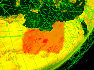 Libya on green model of planet Earth with network at night. Concept of digital technology, communication and travel.