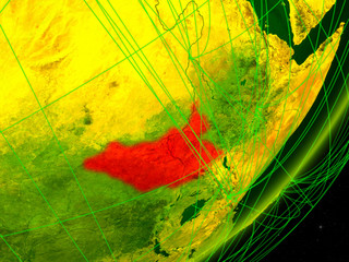 South Sudan on green model of planet Earth with network at night. Concept of digital technology, communication and travel.