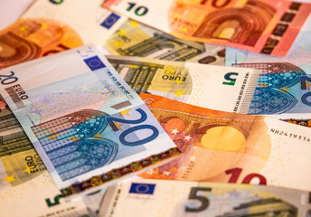 Pile of paper euro banknotes.