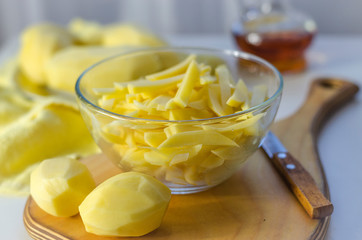 peeled and sliced raw potatoes