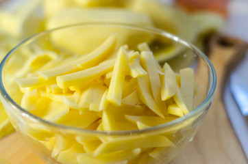 peeled and sliced raw potatoes