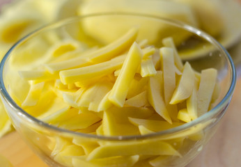 peeled and sliced raw potatoes