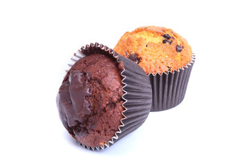 Assorted with Delicious homemade muffin, cupcake with raisins, nuts and chocolate isolated on white background.