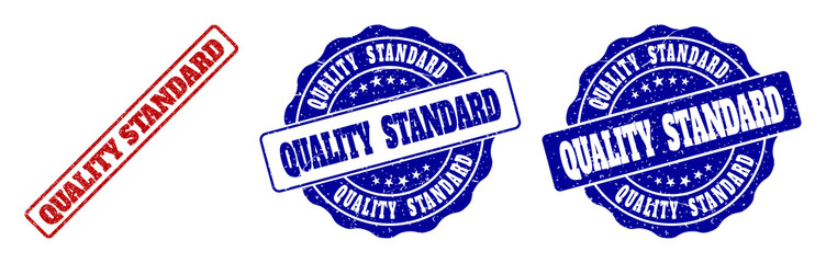 QUALITY STANDARD scratched stamp seals in red and blue colors. Vector QUALITY STANDARD signs with grunge effect. Graphic elements are rounded rectangles, rosettes, circles and text tags.