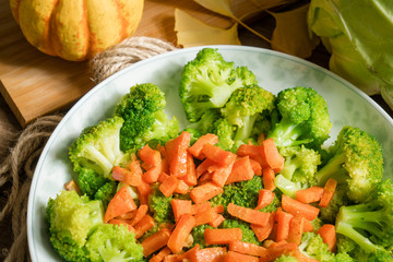 Green broccoli with wooden background