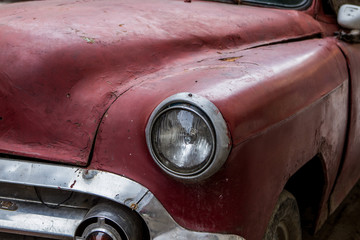 Antique red car in Havana Cuba