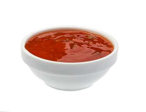 Red Hot Chilli Pepper Sauce In Ceramic Bowl Isolated On White Background