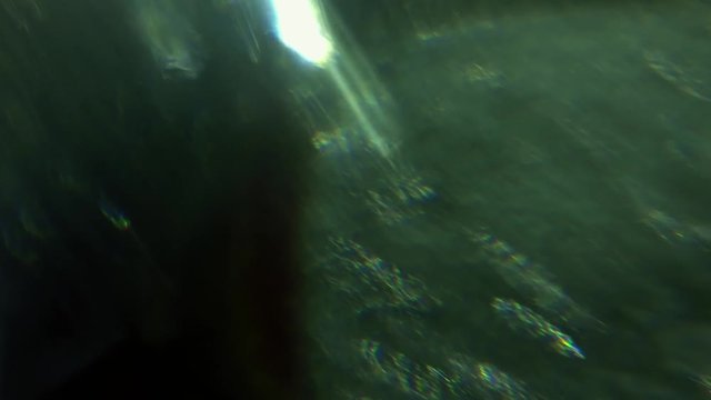 Green colored rgb bokeh, spectral futuristic colors, holographic iridescent material. 4k footage.