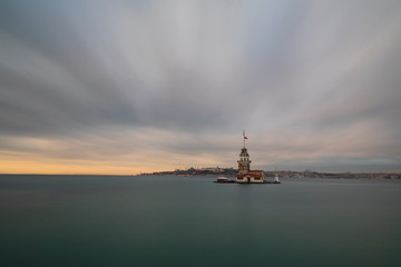 Fototapeta premium Maiden Tower (Tower of Leandros, Turkish: Kiz Kulesi) tranquil scenery at the entrance to Bosporus Strait in Istanbul, Turkey (KIZ KULESI – SALACAK-USKUDAR)