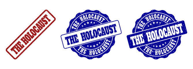 THE HOLOCAUST grunge stamp seals in red and blue colors. Vector THE HOLOCAUST signs with grunge effect. Graphic elements are rounded rectangles, rosettes, circles and text labels.