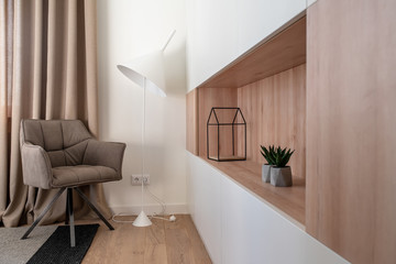 Stylish modern interior with white walls and parquet