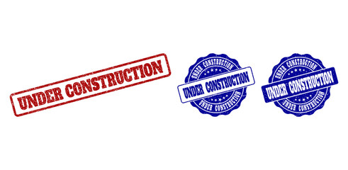 UNDER CONSTRUCTION scratched stamp seals in red and blue colors. Vector UNDER CONSTRUCTION overlays with draft style. Graphic elements are rounded rectangles, rosettes, circles and text captions.