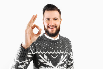Naklejka premium Portrait of a man with a beard, showing a gesture of approval, gesture well.