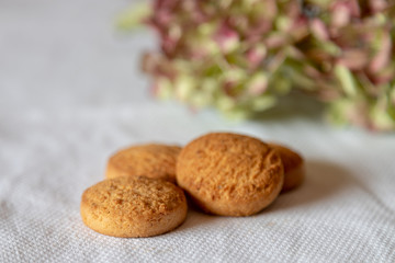 dry biscuits on a white tablecloth