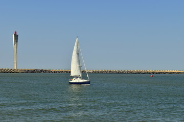 yacht sailing on calm sea