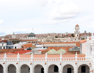 Cityscape of Sucre, Bolivia with the tower of the cathedral visible.
