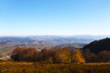 Fototapeta na wymiar Beautiful mountain landscape with blue sky on sunny day, blurred view