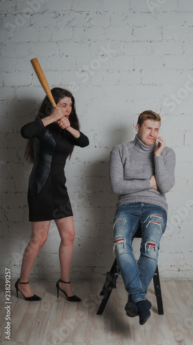A Girl Swings A Baseball Bat At A Guy A Student Bully
