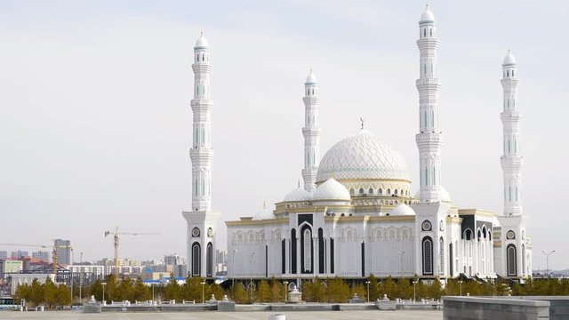 View of the beautiful white mosque in the city